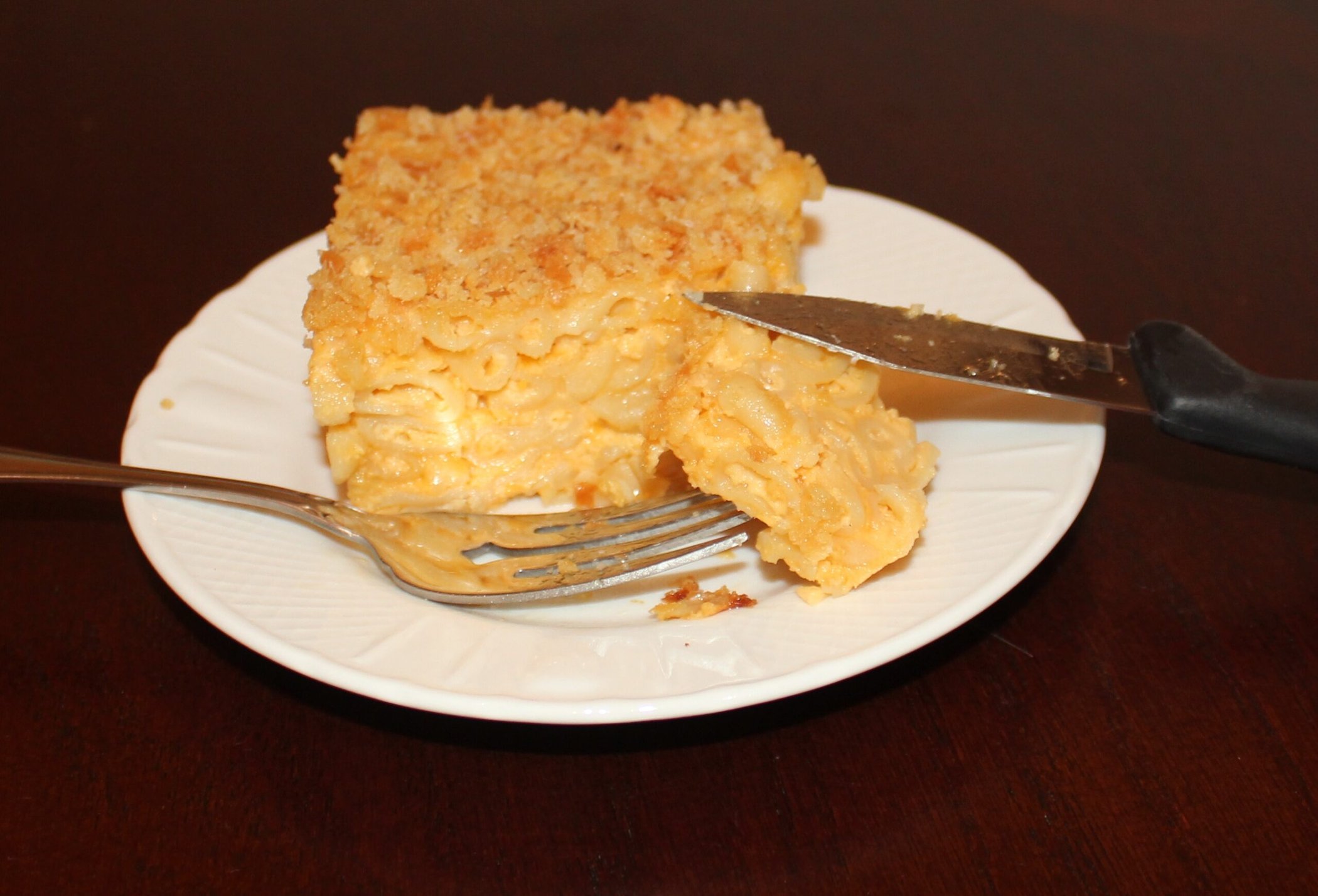 Baked macaroni and cheese casserole served on a plate for an easy family dinner