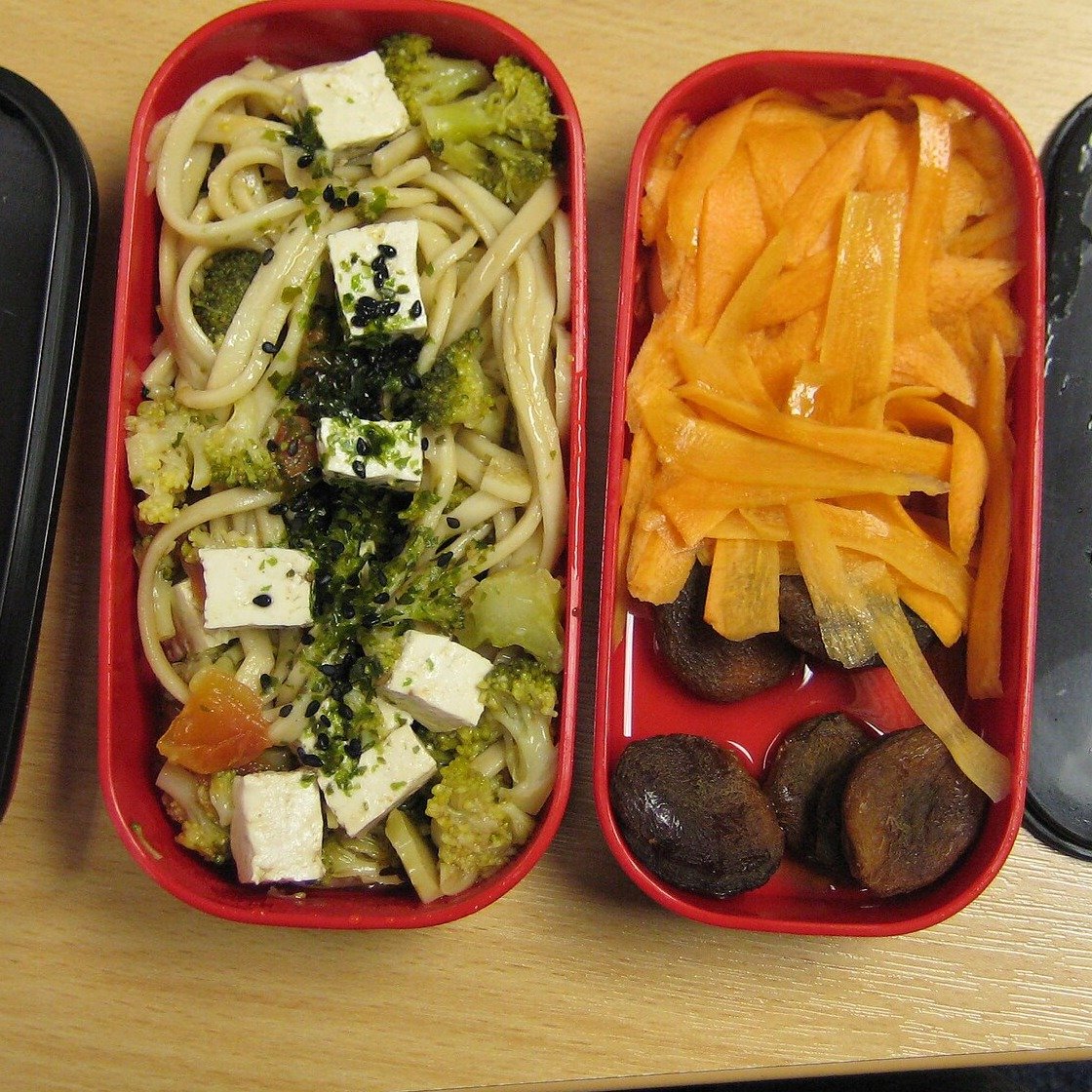 High-protein kids snack bento box with tofu noodles, broccoli, carrots, and fruit